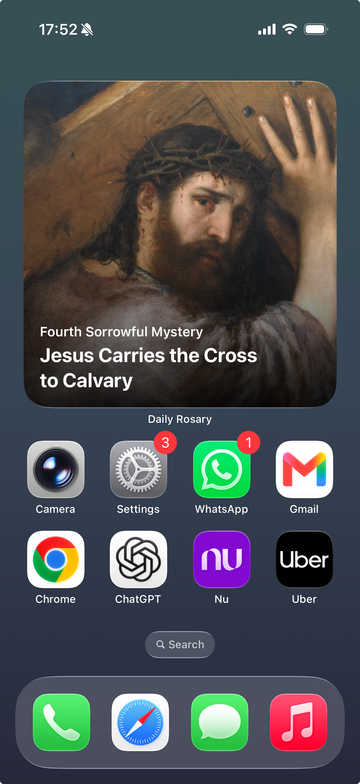 Home Screen with the large Daily Rosary widget showing Jesus carrying the cross to Calvary.